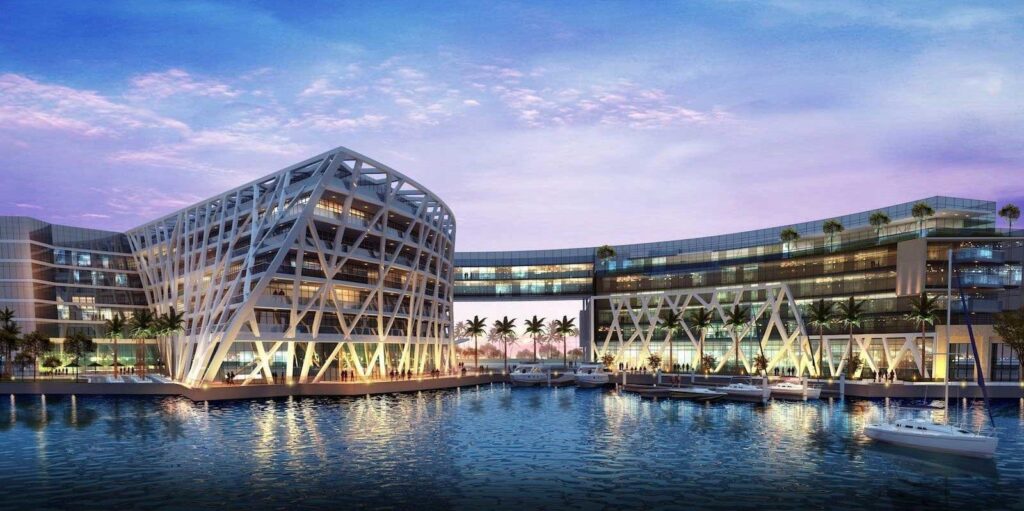The exterior of The Abu Dhabi EDITION above the berths at Al Bateen Marina
