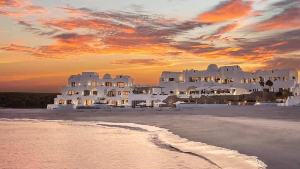 The whitewashed walls and blue domes of Anantara Retreat Santorini Abu Dhabi at Al Jarf