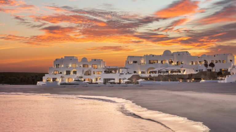 The whitewashed walls and blue domes of Anantara Retreat Santorini Abu Dhabi at Al Jarf