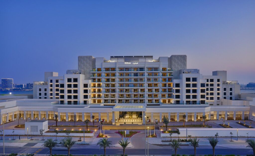 The twin towers of Hilton Abu Dhabi Yas Island seen from Yas Bay
