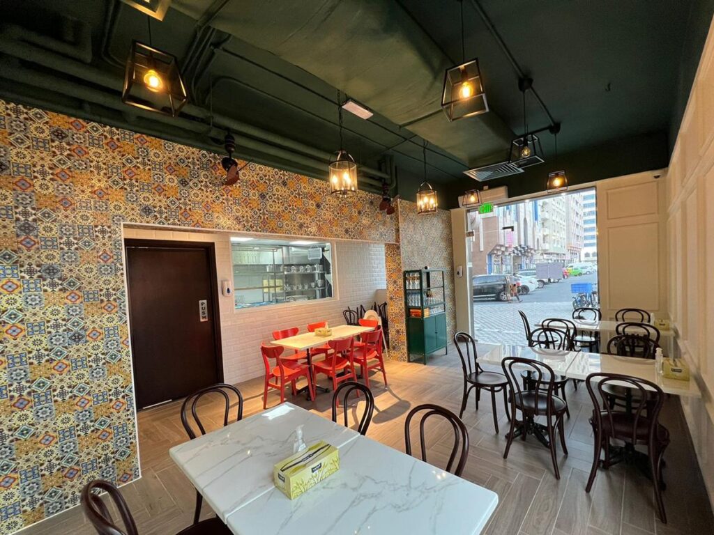 Kopitiam by Chandy's compact dining room on Al Falah Street Abu Dhabi