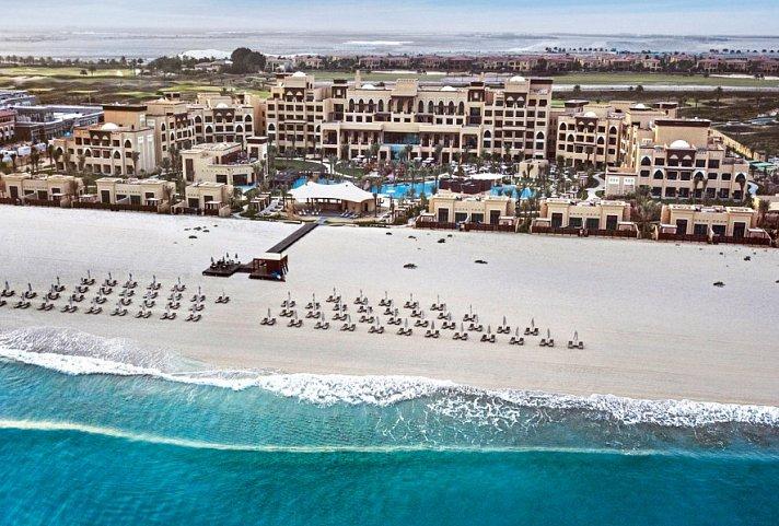 The exterior of Saadiyat Rotana Resort and Villas seen from the gardens