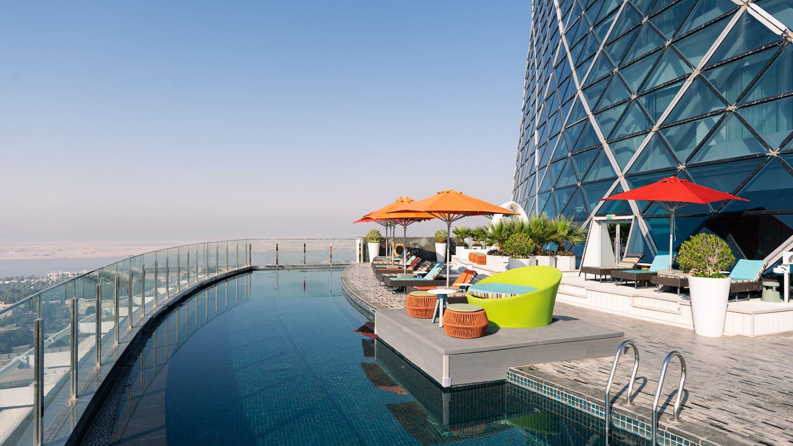 The rooftop pool deck and The Lean bar nineteen floors above Abu Dhabi