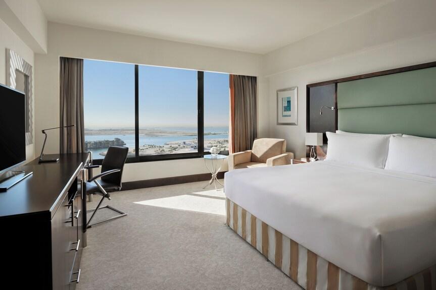 A Classic Room of around forty one square metres with a sea view over the marina