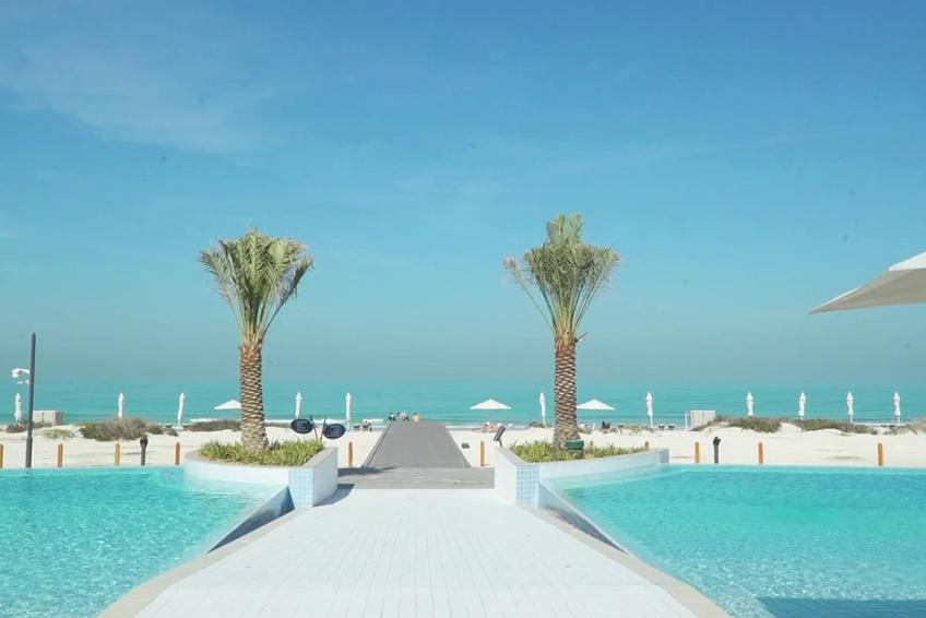 One of the three infinity pools stepping down towards the sand