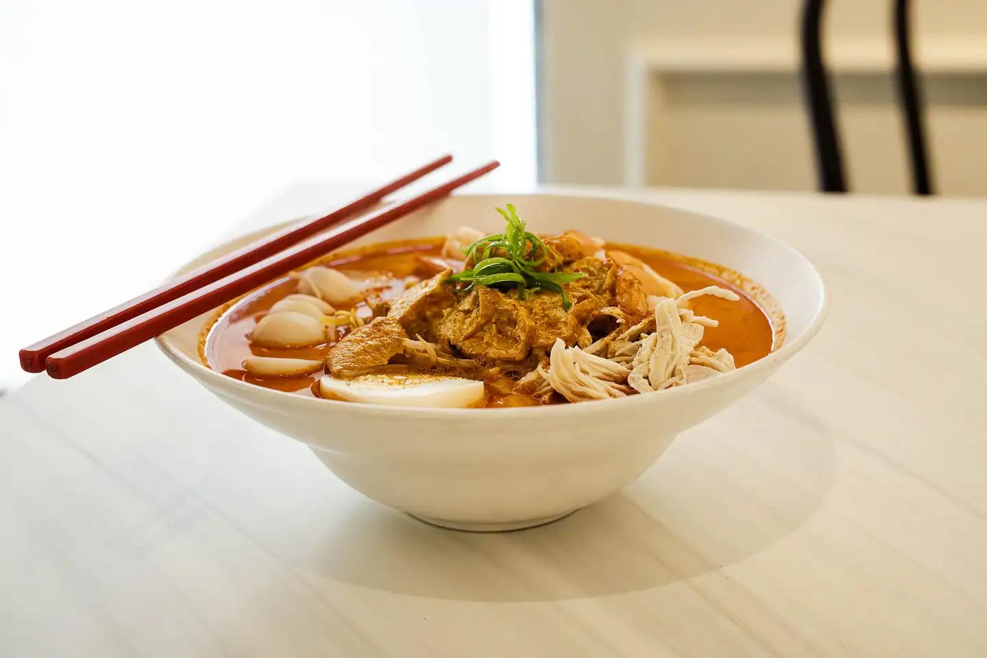Malaysian curry laksa and nasi lemak at Kopitiam by Chandy's Abu Dhabi