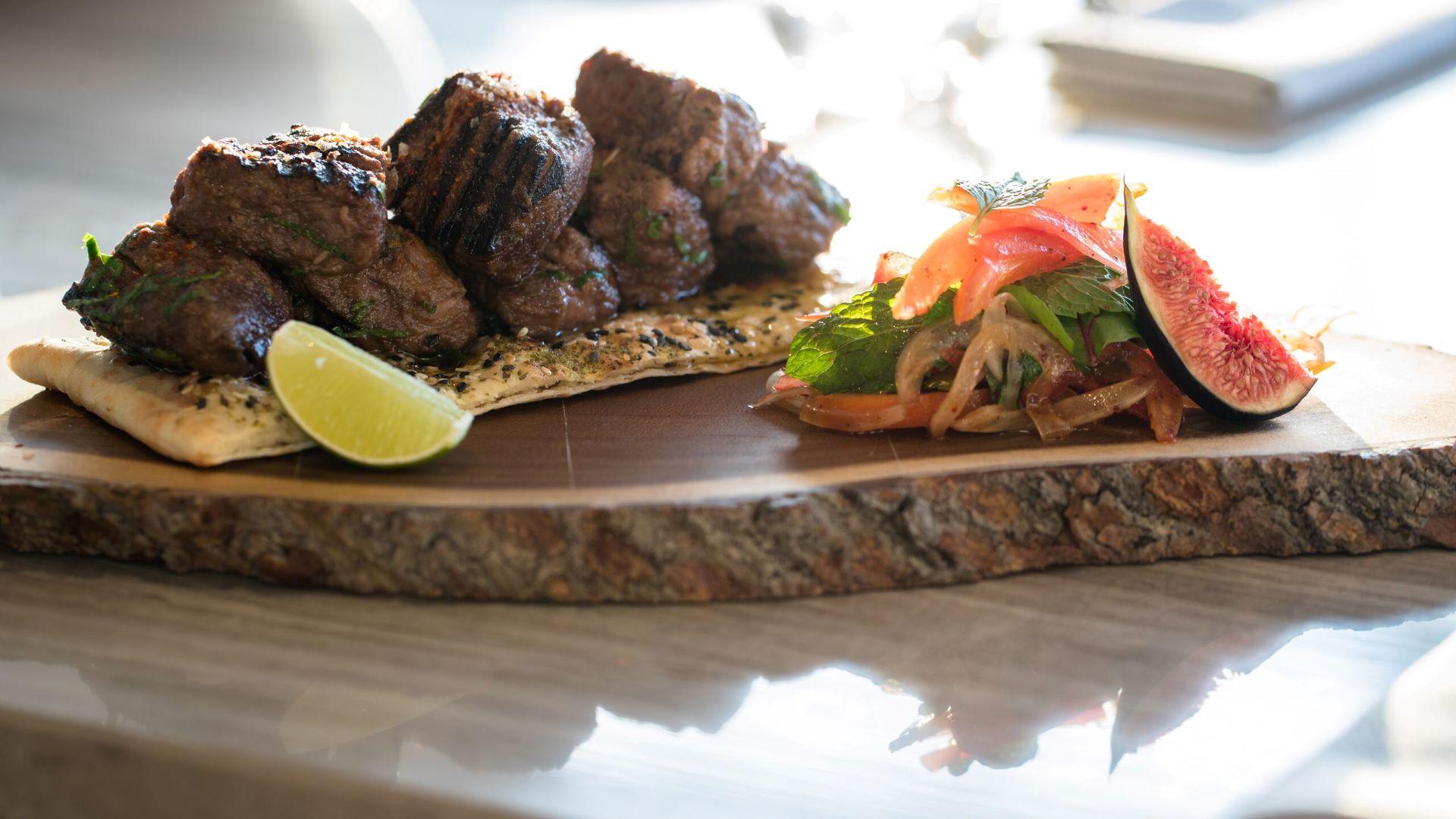 Premium grilled beef and lamb dishes at Orient Restaurant Saadiyat