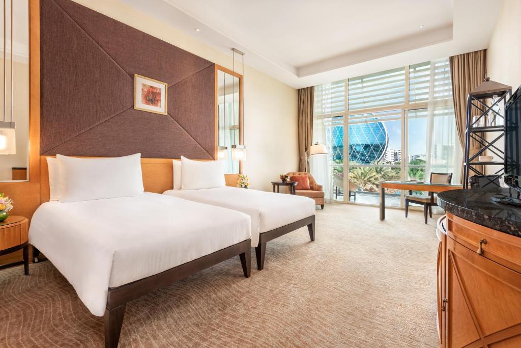 A sea facing room with a balcony over the Al Raha channel