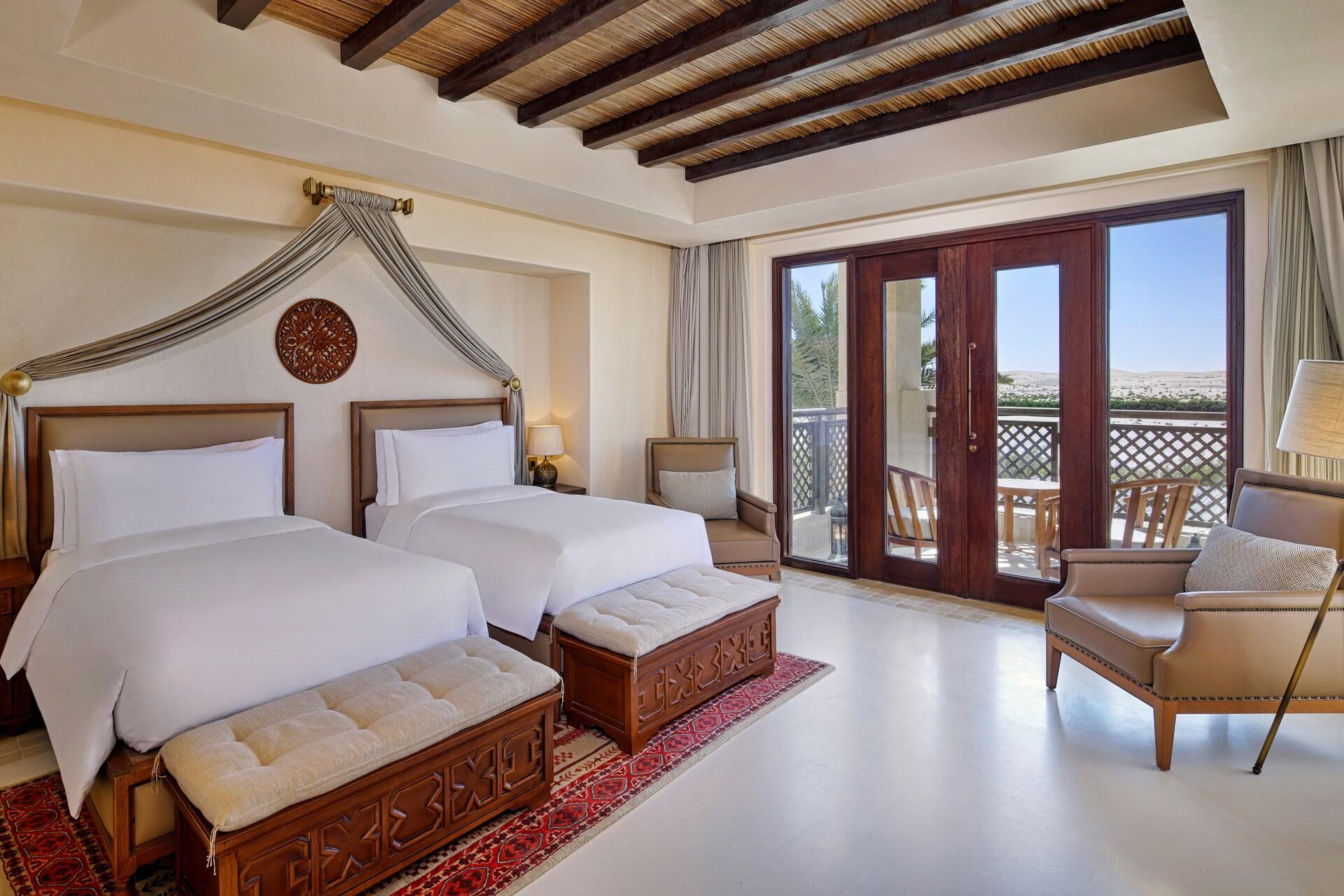 A forty five square metre Superior Room with a balcony reached from an exterior walkway