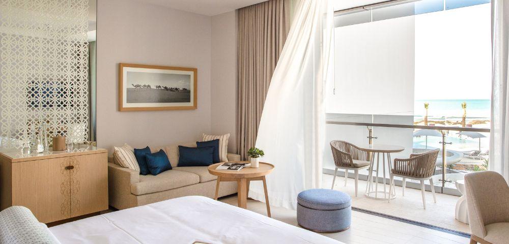 An entry level room of close to fifty square metres with a Gulf facing balcony