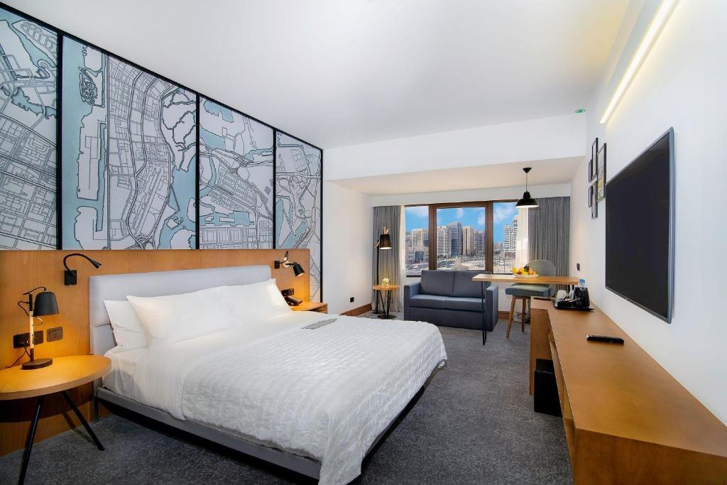 A garden view room opening onto the landscaped grounds
