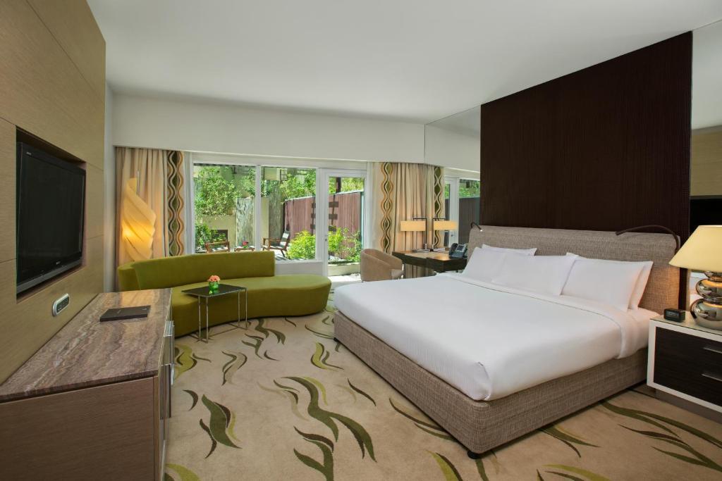 A premier room of forty two square metres with a city outlook