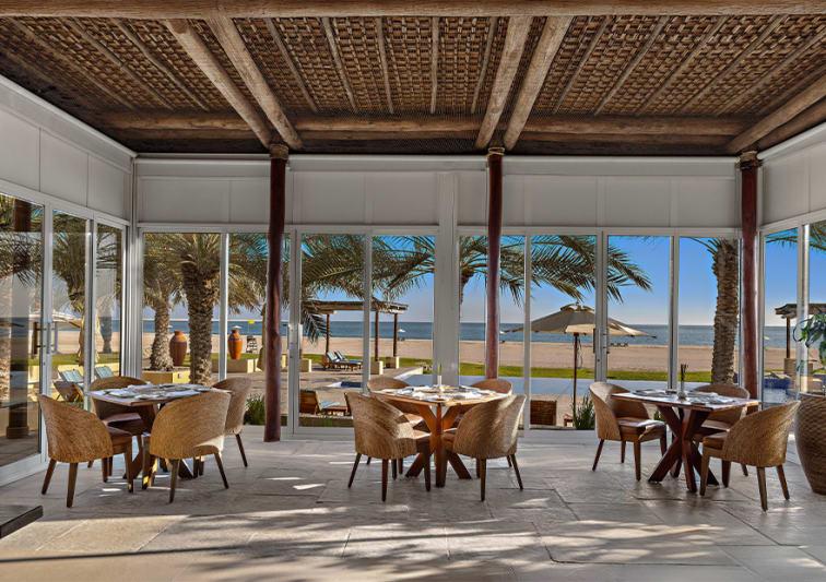 Josper-grilled lamb and beachfront dining at Olio Restaurant & Lounge