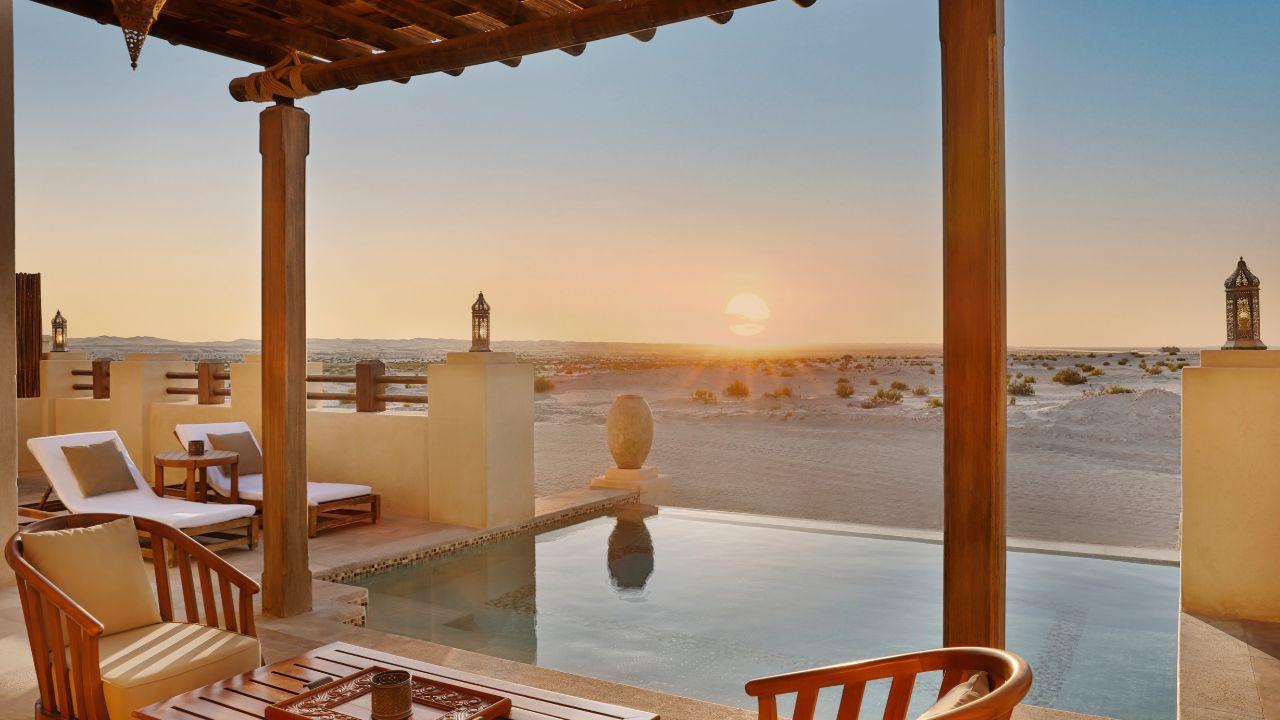A one bedroom pool villa with a private pool and a desert terrace