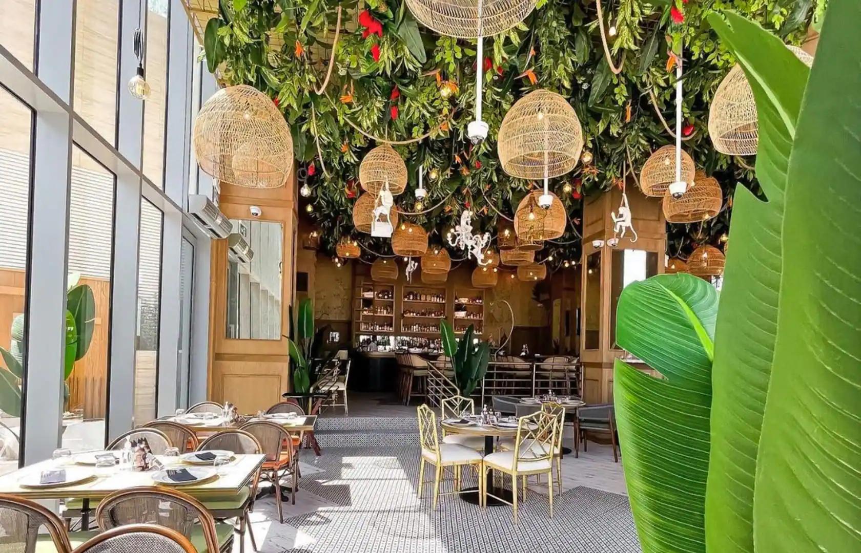 Raclette French brasserie interior with Arabian Gulf views at Saadiyat Island