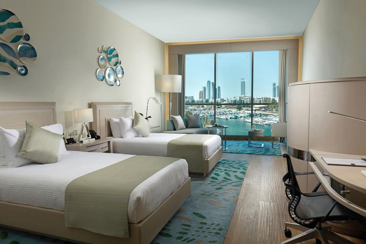 A marina facing Premium Room with a balcony over the yacht berths