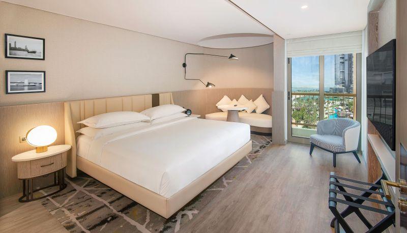 A classic room with a Corniche view and the Sheraton Signature bed