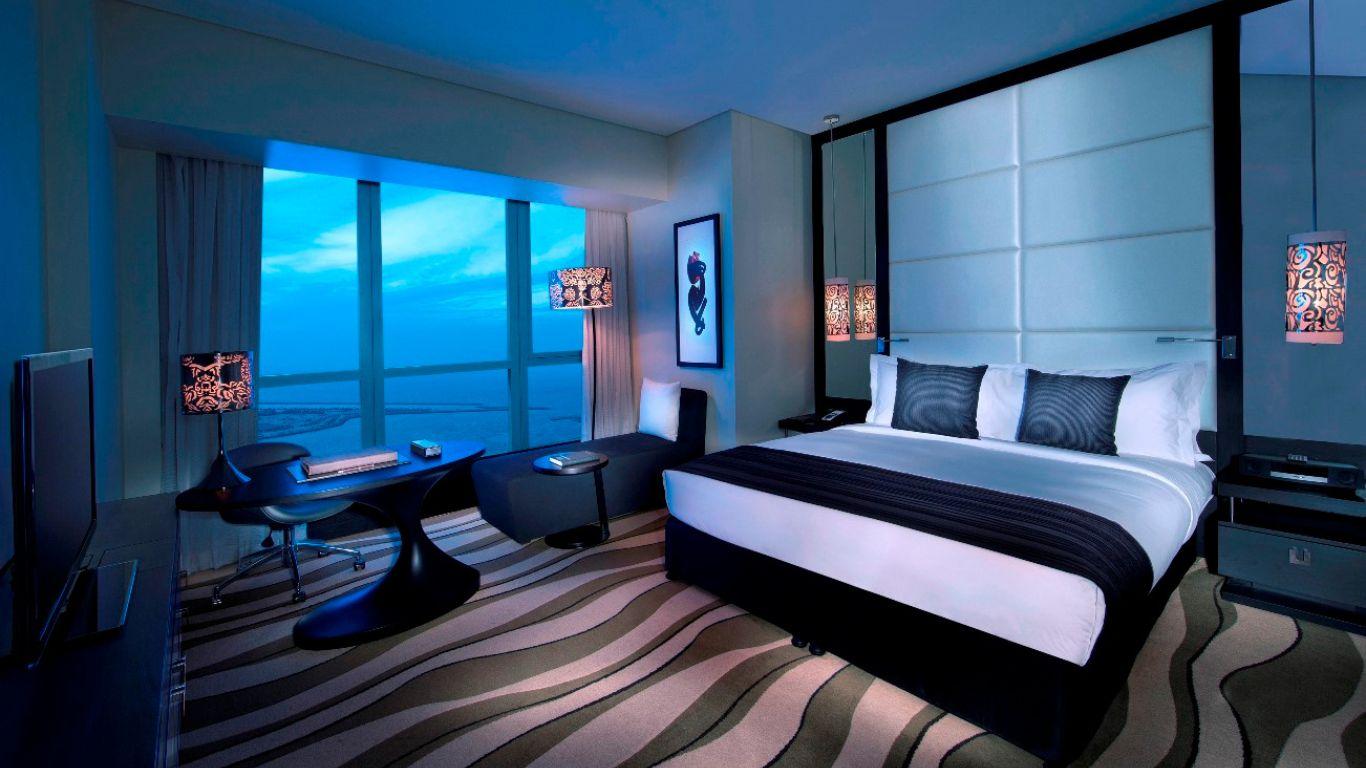 A Luxury sea view room with contemporary furnishings and a full Gulf horizon