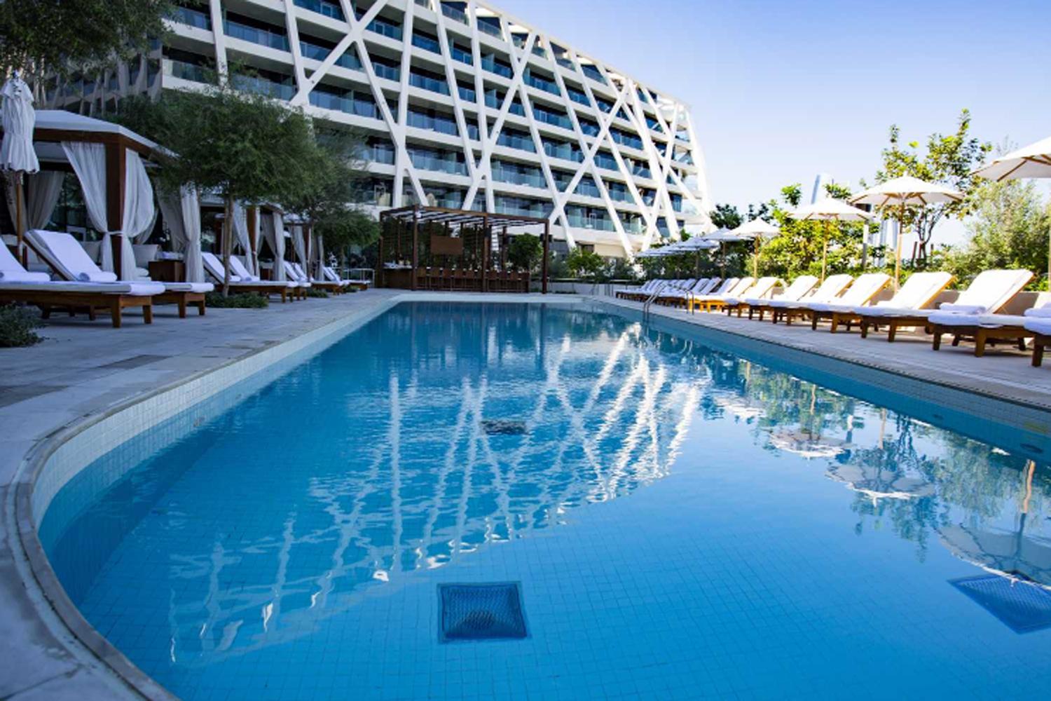 The outdoor pool and terrace above the yacht harbour