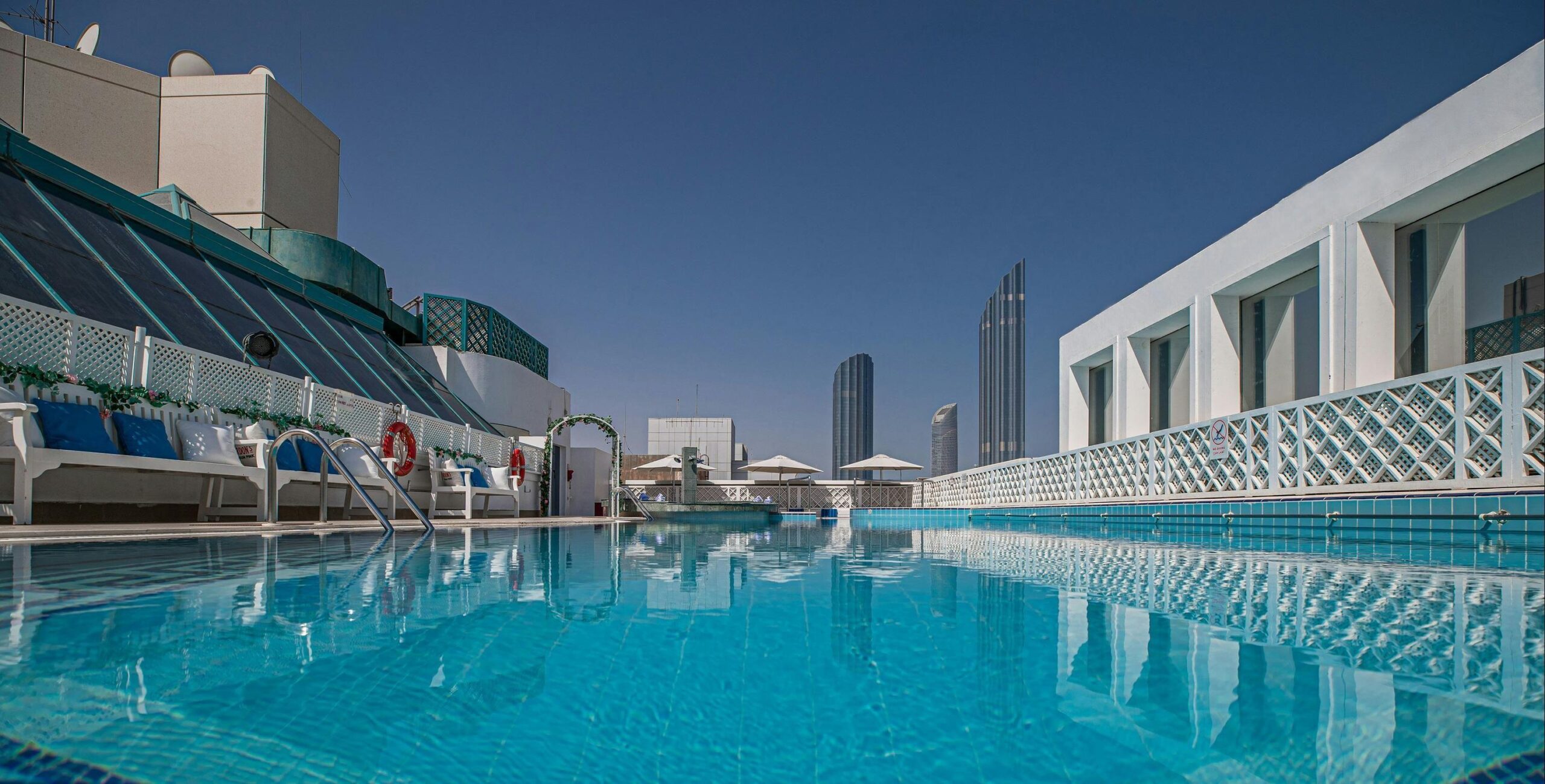 The rooftop swimming pool and terrace with loungers