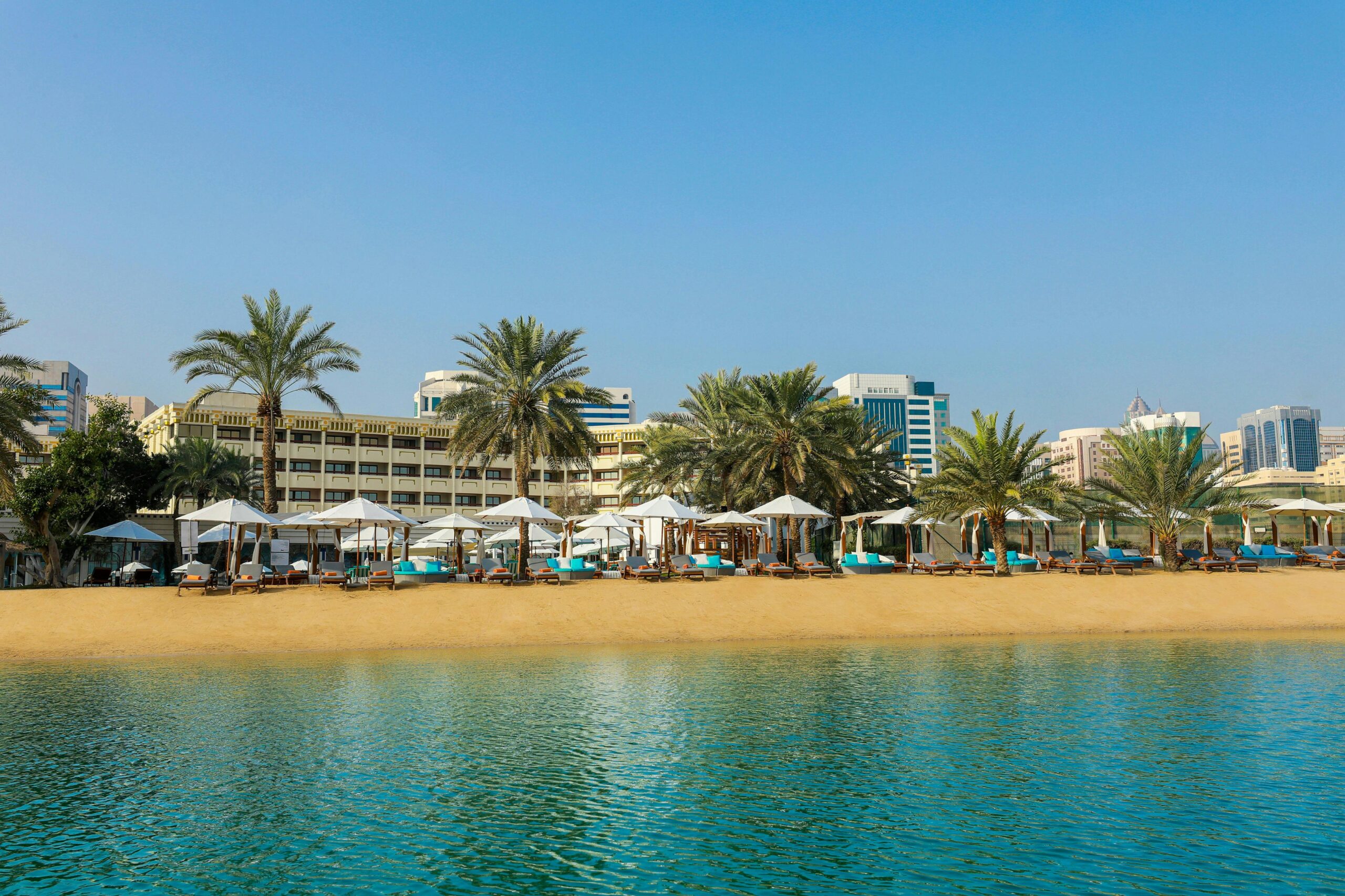 The two hundred metre private beach with loungers and umbrellas