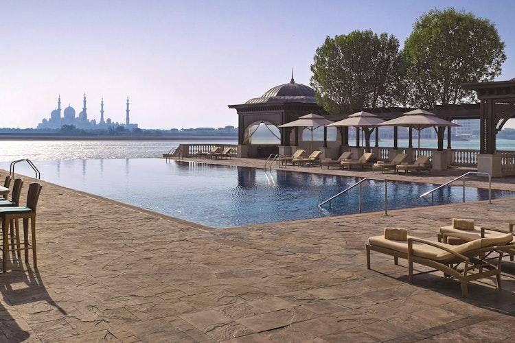 One of the four outdoor pools set behind the private beach