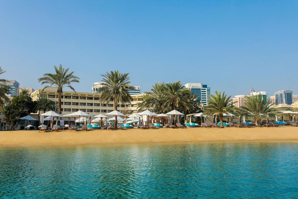 Complimentary cabanas, umbrellas and loungers on the private beach