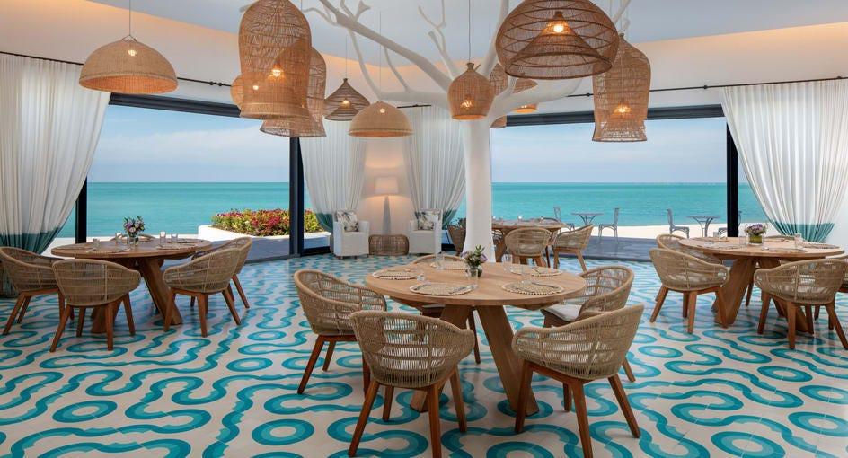 Evening tables set at Thalassa, the Mediterranean restaurant