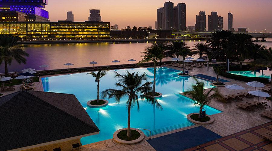 The infinity pool at Beach Rotana above the private beach