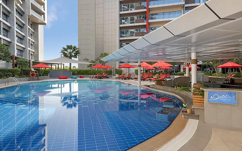 The outdoor pool, terrace and loungers