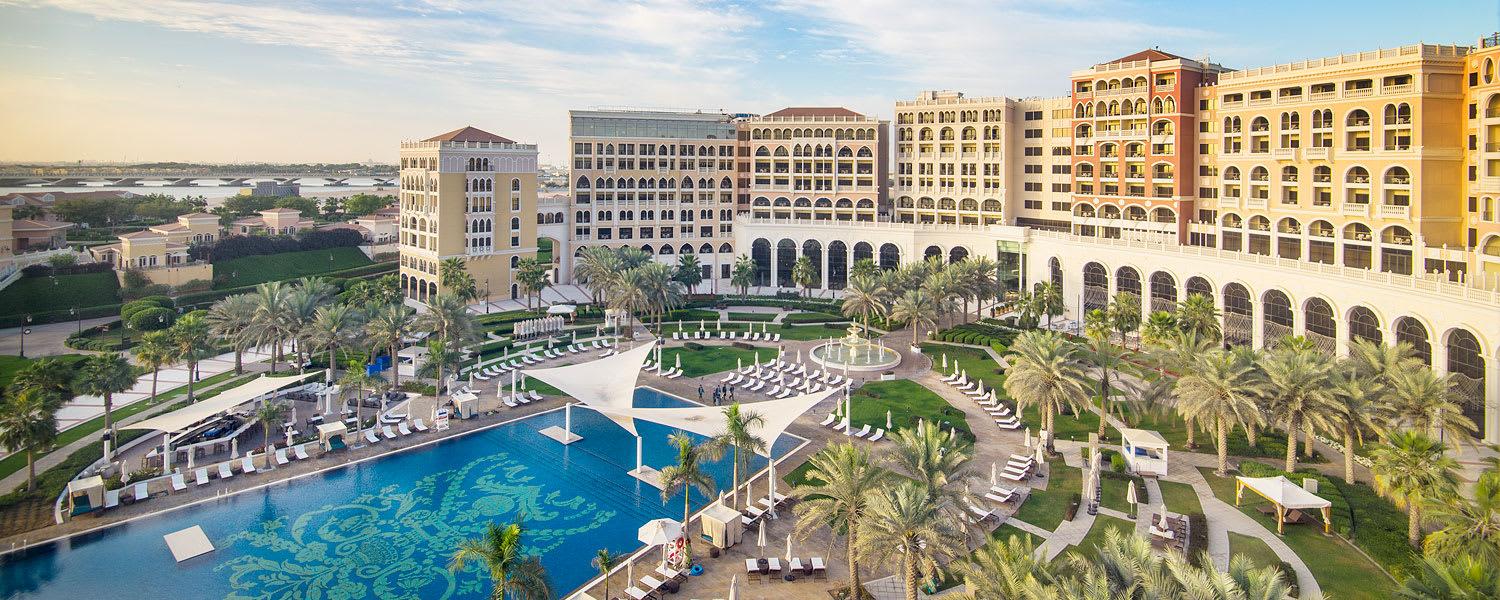 The larger of the two outdoor pools, with complimentary cabanas