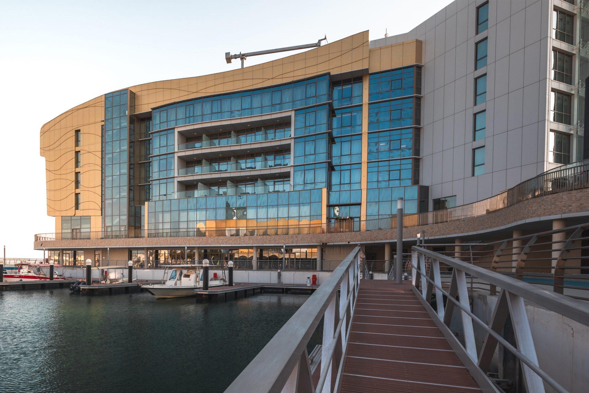 Yachts moored along the Al Bateen Marina promenade