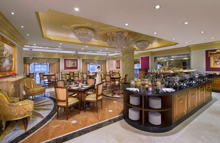 Printania Restaurant with its live cooking stations laid for the buffet