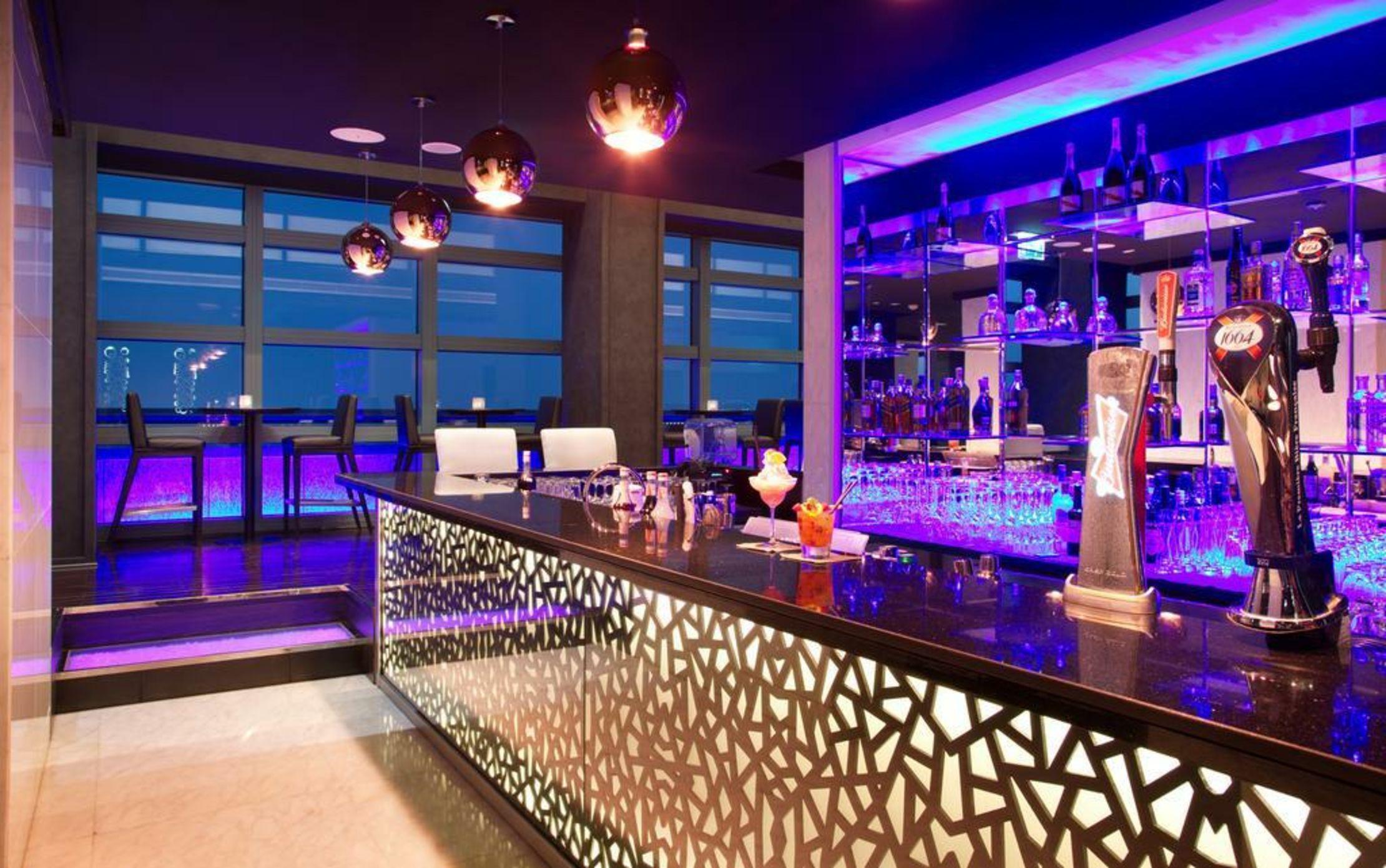 Jazz and Fizz Bar during a live set, with the cocktail counter in view