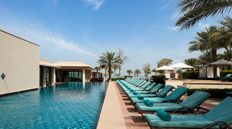 The outdoor lap pool beside the beach