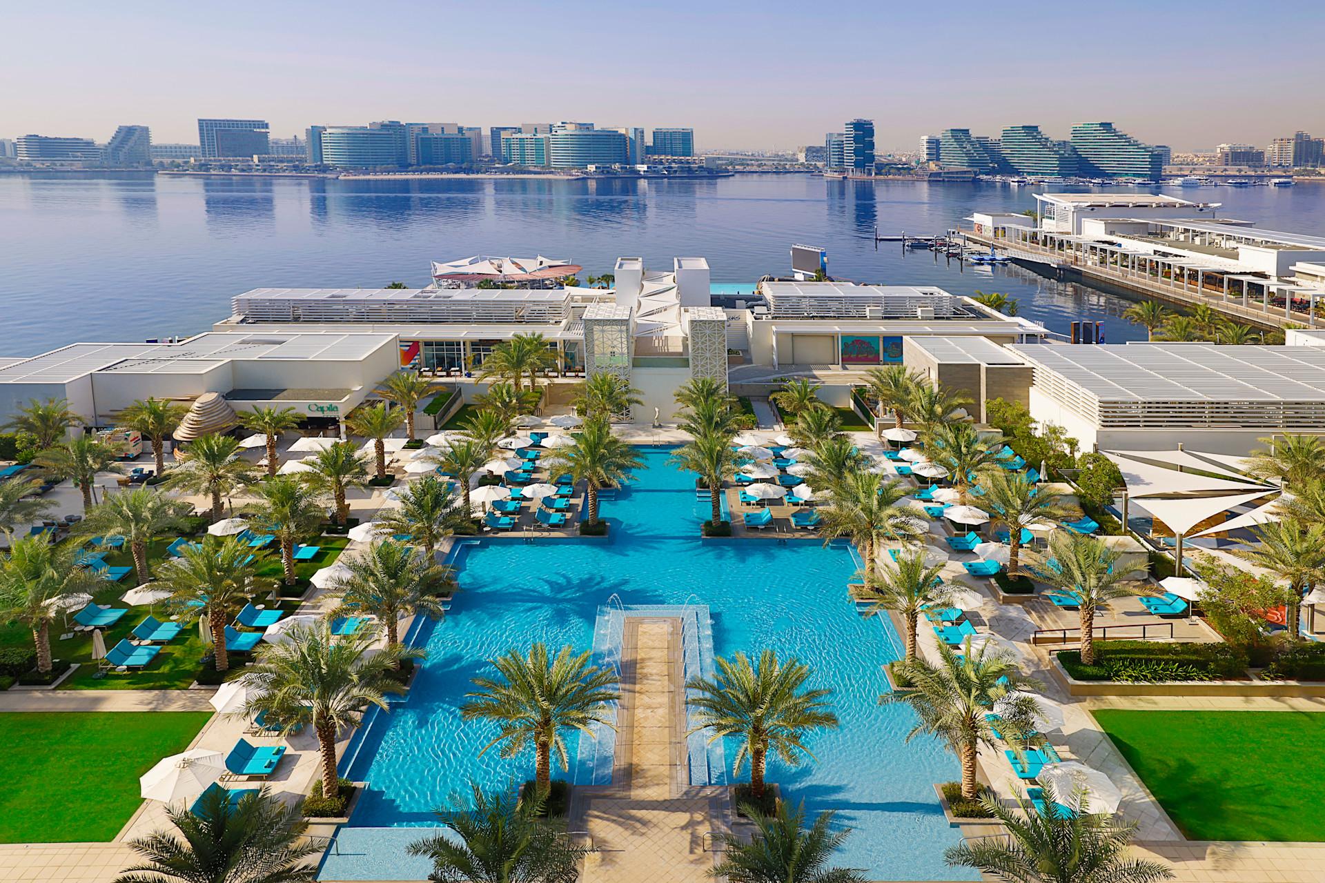 The outdoor pool and terrace serving the two towers