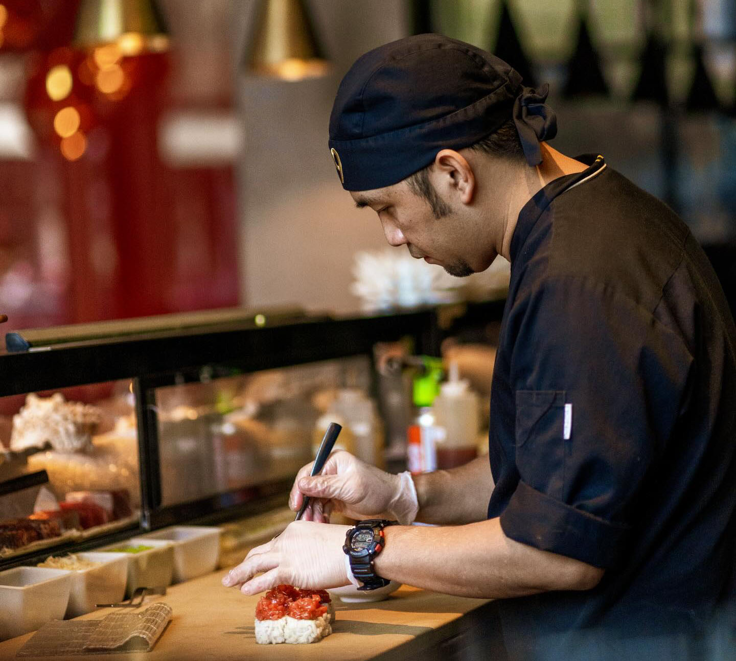 Omakase counter and contemporary Japanese plates at 99 Sushi Bar Abu Dhabi