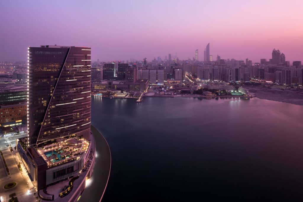 The knife edge glass tower of Rosewood Abu Dhabi rising above Al Maryah Island
