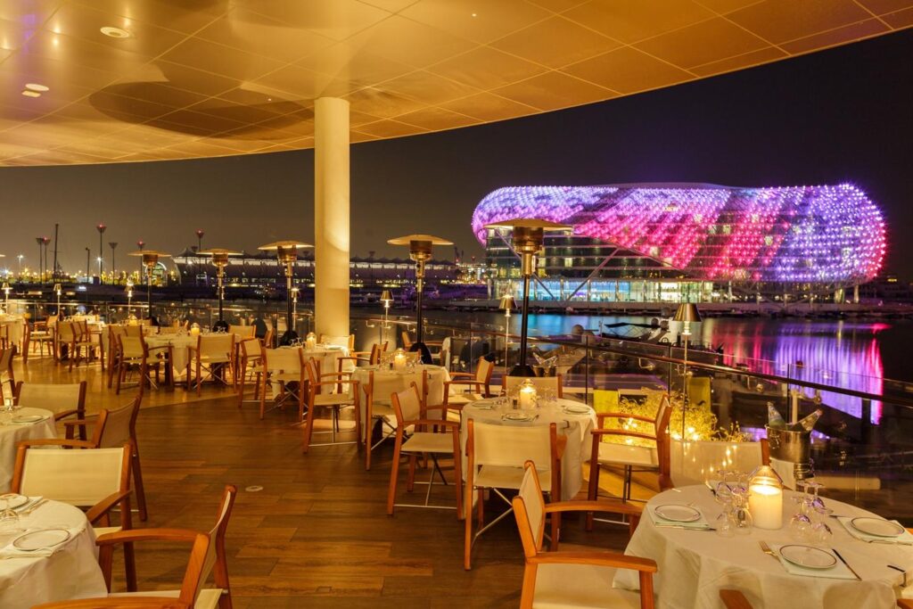 Cipriani Yas Island dining room and terrace overlooking Yas Marina