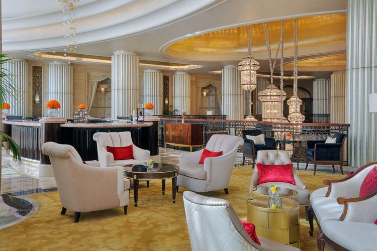 Crystal Lounge mezzanine seating and blown-glass chandelier at The St. Regis Abu Dhabi