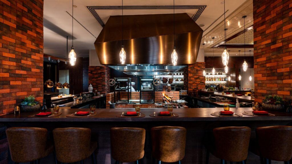 Maté Abu Dhabi open kitchen and wood-fired grill at Park Hyatt Saadiyat Island