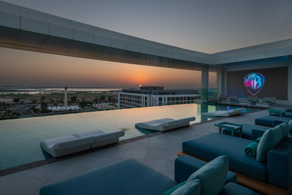 The Overlook rooftop pool lounge at The WB Abu Dhabi with Yas Island views