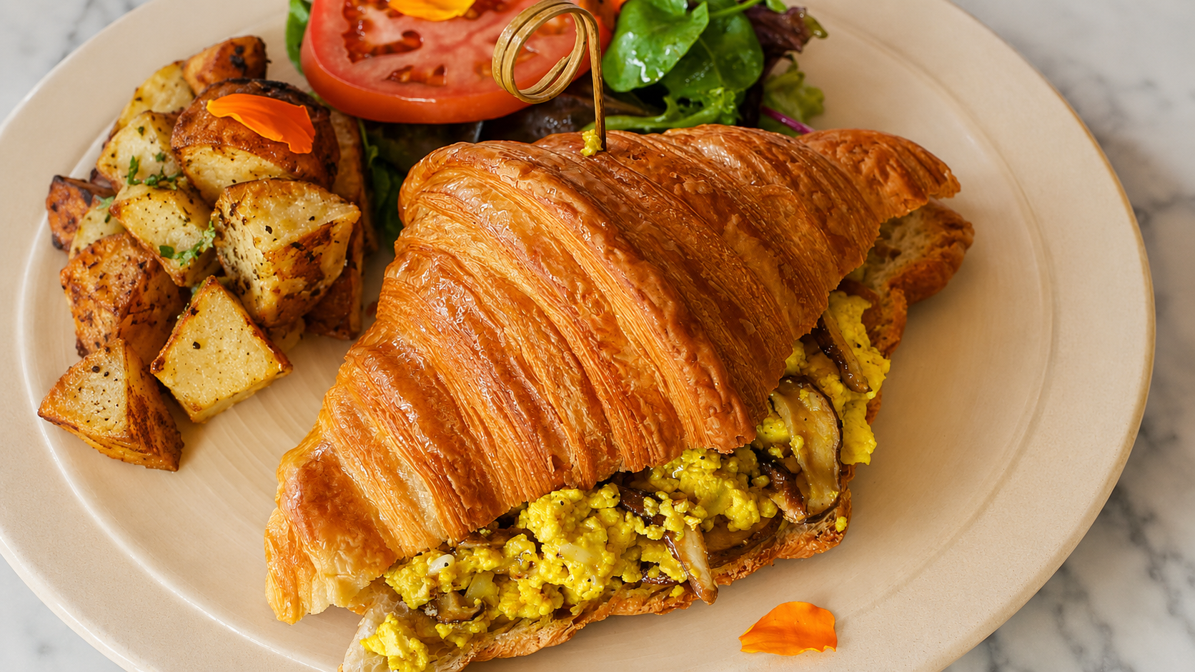Eggplant shakshuka vegan croissant and plant-forward dishes at Alkalime