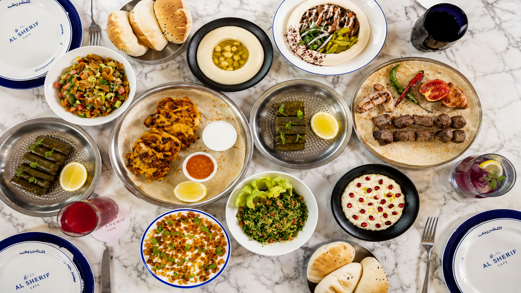 Lebanese mezze and family-style dishes at Em Sherif Cafe Abu Dhabi Desserts, coffee and polished