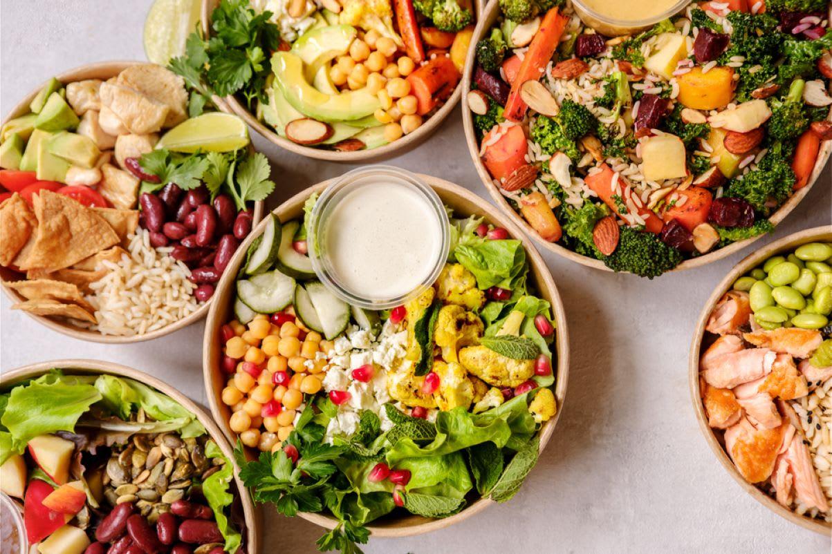 Fresh salads grain bowls and wraps served at Sweet Greens Rihan Heights