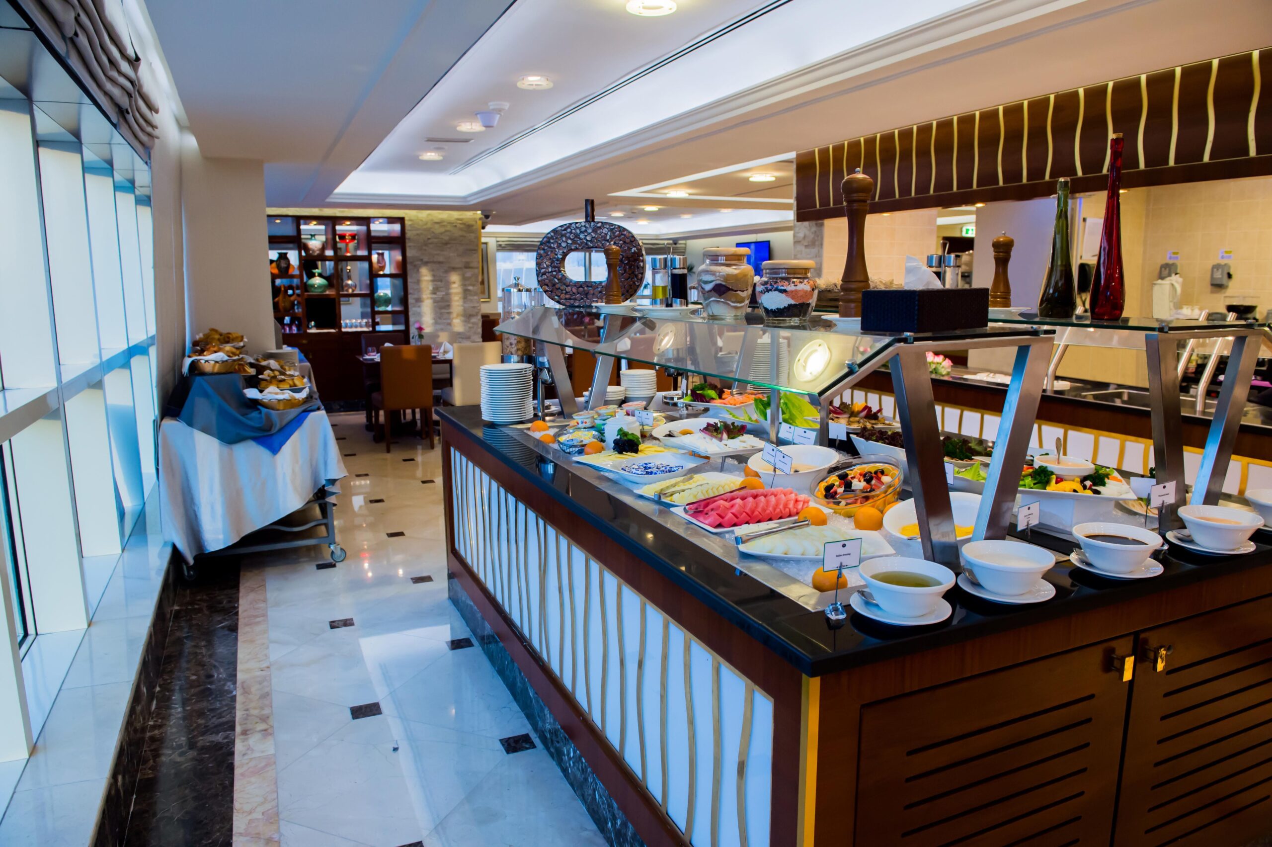 Breakfast buffet and casual all-day dining setting at Bistro Med on Hamdan Street