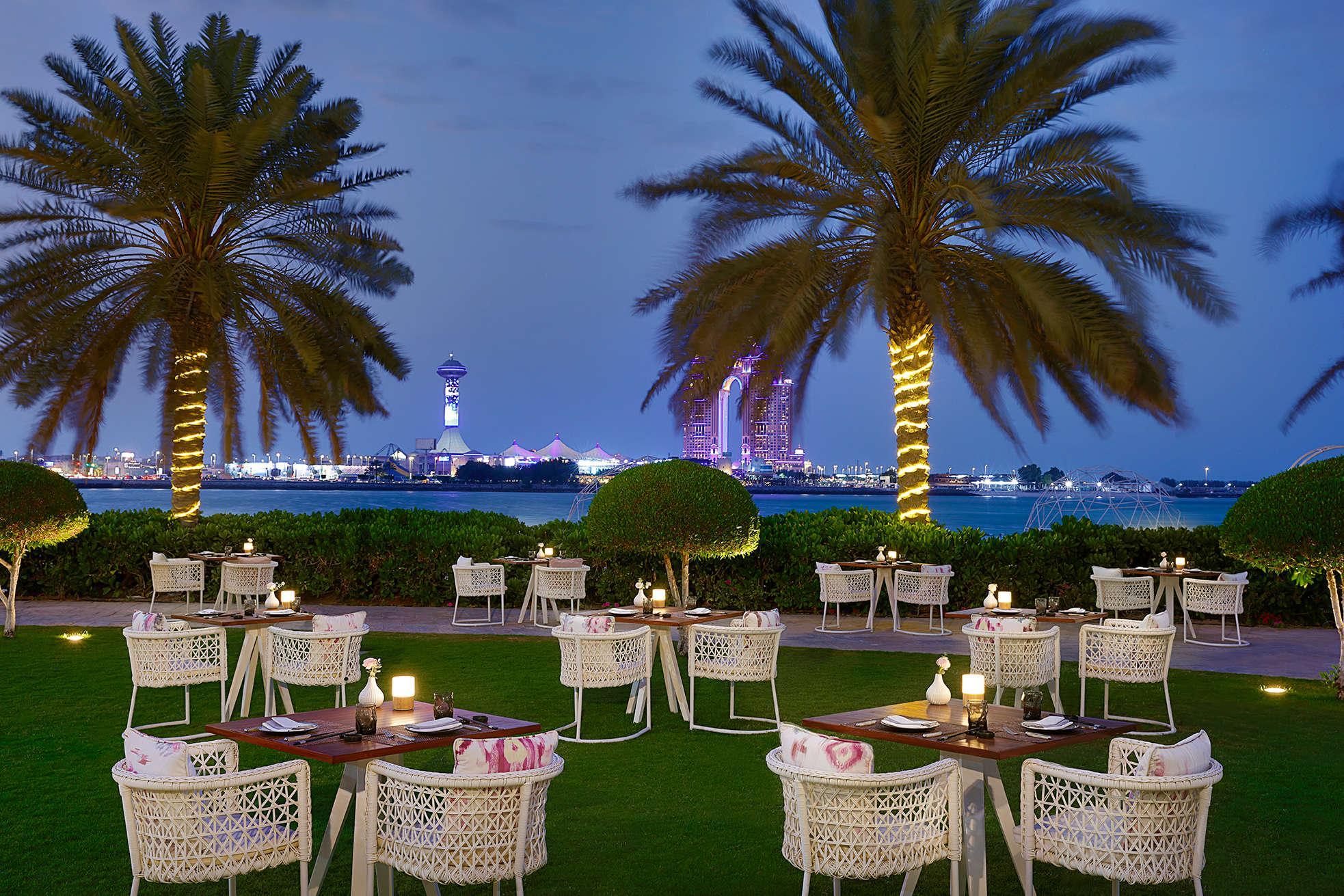 Outdoor terrace and waterfront atmosphere at Catch at St. Regis Abu Dhabi