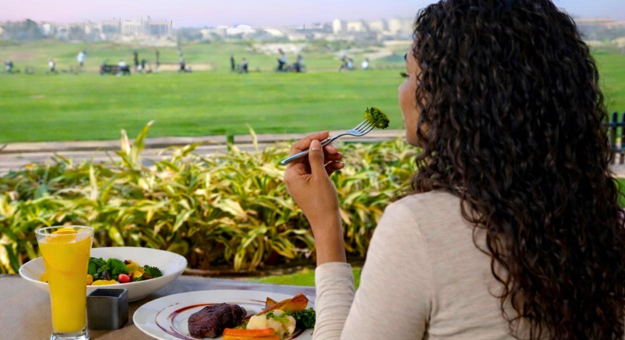 Relaxed country-club dining and golf-course views at Hawksbill Restaurant Abu Dhabi