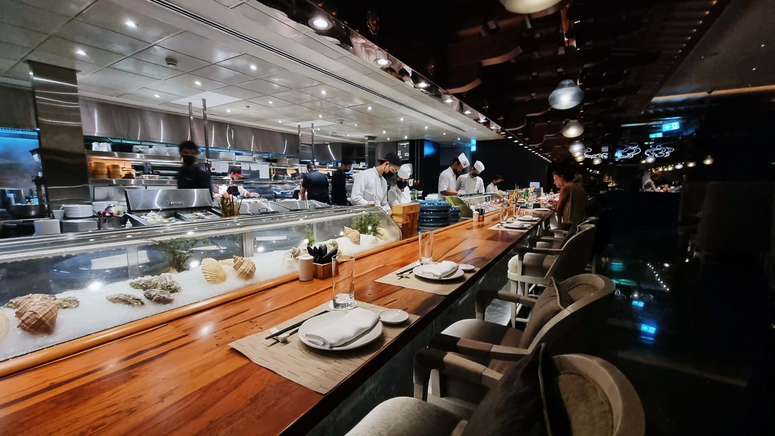 French bistro dining and sushi counter at Salmontini Abu Dhabi