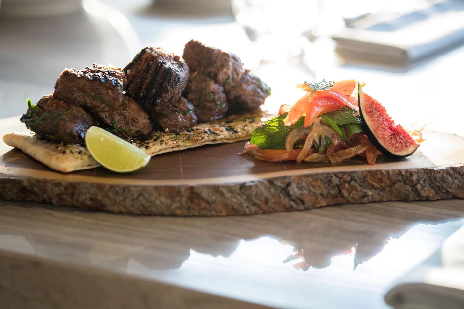 Charcoal-grilled meats served at Tean Jumeirah Saadiyat Island